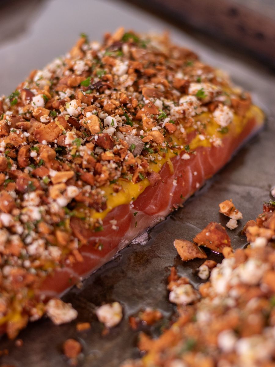Delicious baked salmon with a crunchy herb crust, perfect for gourmet meals and healthy dining.