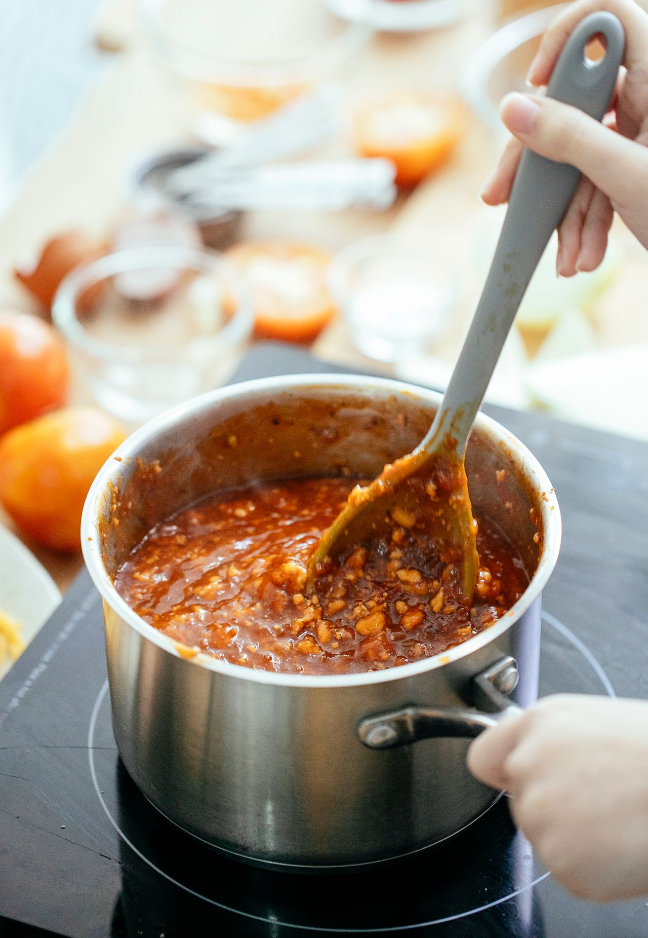 crop-person-cooking-delicious-chili-