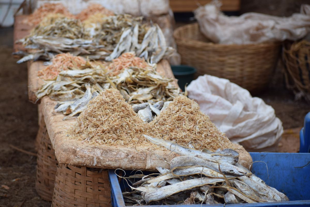 Piles of dry fish on display at a local village market in Maharashtra, India.